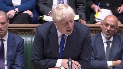 British Prime Minister Boris Johnson speaks during the weekly question time debate, in Parliament in London. (via REUTERS)