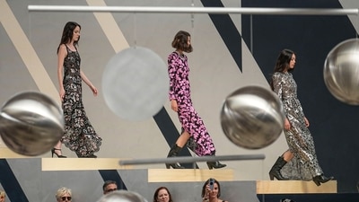 Models wear creations as part of Chanel's Haute Couture Fall/Winter 2022-2023 fashion collection. (AP) Models wear creations as part of Chanel's Haute Couture Fall/Winter 2022-2023 fashion collection. (AP)