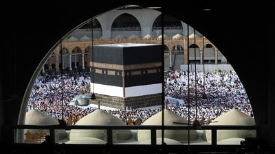 Muslim worshippers around the Kaaba at the Grand Mosque in Saudi Arabia's holy city of Mecca on July 5, 2022. - One million people, including 850,000 from abroad, are allowed to participate in this year's hajj -- a key pillar of Islam that all able-bodied Muslims with the means are required to perform at least once -- after two years of drastically curtailed numbers due to the coronavirus pandemic. (Photo by AFP) Muslim worshippers around the Kaaba at the Grand Mosque in Saudi Arabia's holy city of Mecca on July 5, 2022. - One million people, including 850,000 from abroad, are allowed to participate in this year's hajj -- a key pillar of Islam that all able-bodied Muslims with the means are required to perform at least once -- after two years of drastically curtailed numbers due to the coronavirus pandemic. (Photo by AFP)