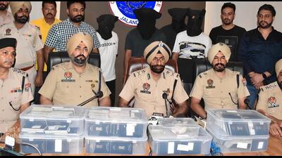 The Jalandhar City police have recovered 536 Indian passports, ₹49,000 cash, a laptop, and three computers from the possession of the four suspects, identified as Nitin, Amit Sharma, Sahil Ghai, and Tajinder Singh. (HT Photo) The Jalandhar City police have recovered 536 Indian passports, ₹49,000 cash, a laptop, and three computers from the possession of the four suspects, identified as Nitin, Amit Sharma, Sahil Ghai, and Tajinder Singh. (HT Photo)