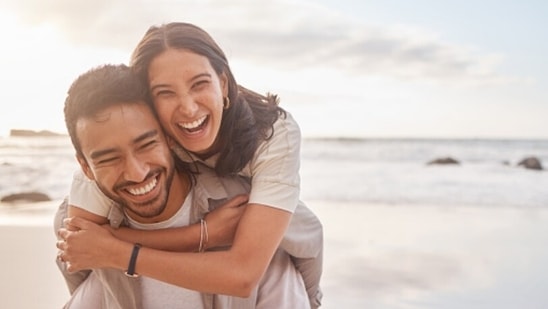 Champion your partner: Accept their successes, be their best cheerleader and talk highly of them in front of others. These small efforts can help in creating a healthy relationship.(Unsplash)