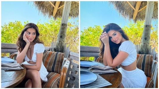 Tara Sutaria found the perfect outfit and spot to beat the summer heat. The actor recently took to her Instagram handle to share a few photos of herself in a white skirt set.(Instagram/@tarasutaria)