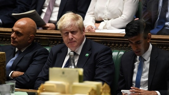 Britain's Health Secretary Sajid Javid (L), Britain's Prime Minister Boris Johnson (C) and Britain's Chancellor of the Exchequer Rishi Sunak.(AFP / File photo) Britain's Health Secretary Sajid Javid (L), Britain's Prime Minister Boris Johnson (C) and Britain's Chancellor of the Exchequer Rishi Sunak.(AFP / File photo)