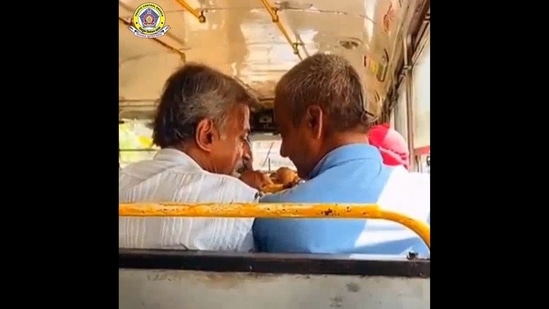 The image, taken from the viral video, showcases two men arguing over a bus seat. (Instagram/@mumbaipolice)