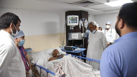 Bihar chief minister Nitish Kumar meets RJD leader, former CM Lalu Prasad Yadav at Paras Hospital with his son, Tejashwi Yadav also present (ANI)