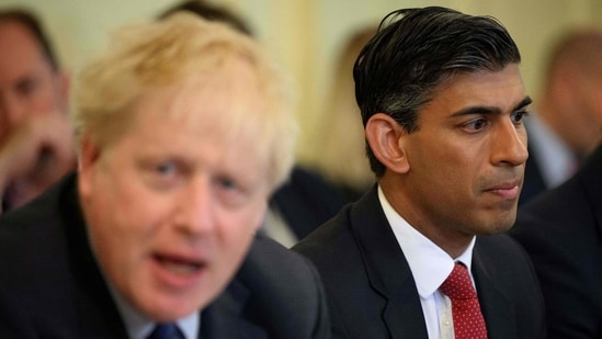 Rishi Sunak reacts as Britain's Prime Minister Boris Johnson speaks during a Cabinet meeting at 10 Downing Street, in London.(AFP / File)