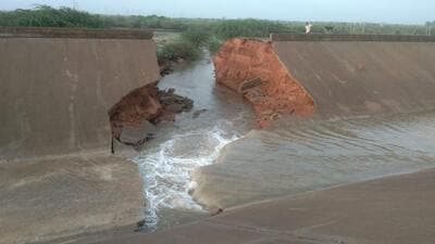Hours after successfully taking the waters of Narmada to Modh Kuva, the village at the tail-end of the Kutch Branch Canal (KBC), the authorities had to stop the flow after a patch in the path breached on Thursday. (HT Photo) Hours after successfully taking the waters of Narmada to Modh Kuva, the village at the tail-end of the Kutch Branch Canal (KBC), the authorities had to stop the flow after a patch in the path breached on Thursday. (HT Photo)