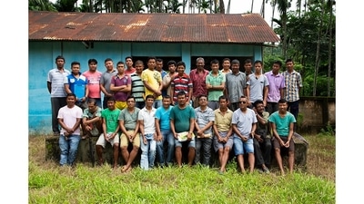 Men representing the 13 clans of the Toto tribe, photographed after an important meeting about an upcoming festival. A few of the clans are more endangered than others, with some consisting of only one family each, and a few down to two or three members. (Abhijit AA / Totos of Totopara) Men representing the 13 clans of the Toto tribe, photographed after an important meeting about an upcoming festival. A few of the clans are more endangered than others, with some consisting of only one family each, and a few down to two or three members. (Abhijit AA / Totos of Totopara)