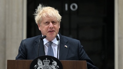 Britain's Prime Minister Boris Johnson makes a statement outside 10 Downing Street in central London. Johnson quit as Conservative party leader, after three tumultuous years in charge marked by Brexit, Covid and mounting scandals. (AFP) Britain's Prime Minister Boris Johnson makes a statement outside 10 Downing Street in central London. Johnson quit as Conservative party leader, after three tumultuous years in charge marked by Brexit, Covid and mounting scandals. (AFP)