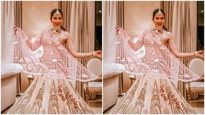 Sonnalli opted for a minimal makeup look to complement her attire. In smokey eyeshadow, black eyeliner, black kohl, mascara-laden eyelashes, drawn eyebrows, contoured cheeks and a shade of maroon lipstick, Sonnalli aced the wedding look to perfection. (Instagram/@sonnalliseygall)