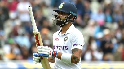 India's Virat Kohli reacts as he walks off the field after losing his wicket to England's Ben Stokes during the third day of the fifth cricket test match between England and India at Edgbaston in Birmingham. (AP)