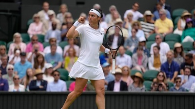 Tunisia's Ons Jabeur celebrates winning a point against Germany's Tatjana Maria in a women's singles semifinal match on day eleven of the Wimbledon tennis championships in London. (AP) Tunisia's Ons Jabeur celebrates winning a point against Germany's Tatjana Maria in a women's singles semifinal match on day eleven of the Wimbledon tennis championships in London. (AP)