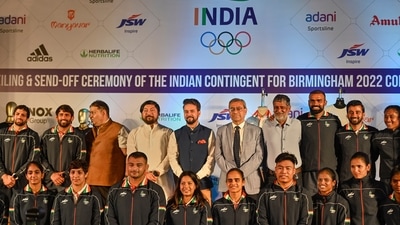 Union Sports Minister Anurag Thakur with Indian contingent during the kit unveiling and send-off ceremony for the Birmingham 2022 Commonwealth Games, in New Delhi. (PTI) Union Sports Minister Anurag Thakur with Indian contingent during the kit unveiling and send-off ceremony for the Birmingham 2022 Commonwealth Games, in New Delhi. (PTI)