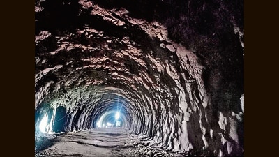 Work on the new, six-lane Khambatki tunnel on national highway 4 (NH-4) is going on in full swing and is expected to be completed in a year. (HT PHOTO) Work on the new, six-lane Khambatki tunnel on national highway 4 (NH-4) is going on in full swing and is expected to be completed in a year. (HT PHOTO)