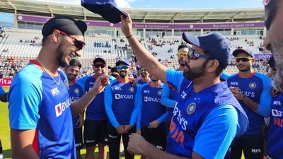 Rohit Sharma gives Arshdeep Singh his maiden Team India cap. (BCCI) Rohit Sharma gives Arshdeep Singh his maiden Team India cap. (BCCI)