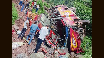 The bus was on its way to Majouri from Gundia in Ramnagar when the driver lost control over the wheel at Keya Morh, sending the bus down the gorge. (HT Photo)