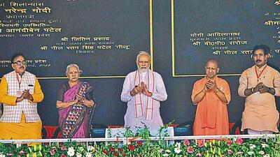 Prime Minister Narendra Modi during inauguration and foundation laying of various projects, at Sampurnanand stadium in Varanasi, Thursday. Uttar Pradesh governor Anandiben Patel and chief minister Yogi Adityanath among others are also seen. (Rajesh Kumar/HT Photo) Prime Minister Narendra Modi during inauguration and foundation laying of various projects, at Sampurnanand stadium in Varanasi, Thursday. Uttar Pradesh governor Anandiben Patel and chief minister Yogi Adityanath among others are also seen. (Rajesh Kumar/HT Photo)