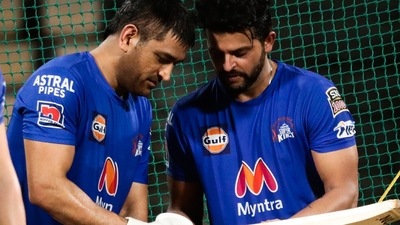 MS Dhoni and Suresh Raina during CSK's practice session in 2021 (Twitter) MS Dhoni and Suresh Raina during CSK's practice session in 2021 (Twitter)