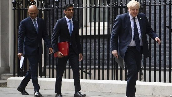 (Left to right) Former British health secretary Sajid Javid, ex-chancellor of the exchequer Rishi Sunak and acting Prime Minister Boris Johnson. (AP) (Left to right) Former British health secretary Sajid Javid, ex-chancellor of the exchequer Rishi Sunak and acting Prime Minister Boris Johnson. (AP)
