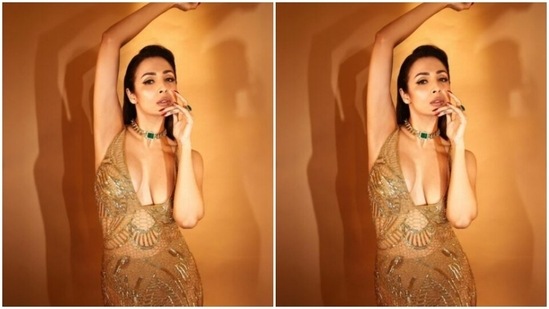 Malaika further accessorised her look in a statement neck choker with an embedded emerald stone from the shelves of Karishma Joolry. Styled by fashion stylist Maneka Hari Singhani, Malaika wore her tresses open in a back brushed look.(Instagram/@malaikaaroraofficial)
