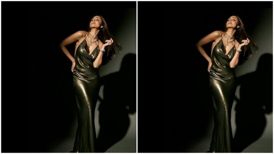 Malaika's fashion diaries are drool-worthy. A few days back, the actor shared a set of pictures of herself where she looked gorgeous in a metallic moss green gown with a halter neck and a plunging neckline.(Instagram/@malaikaaroraofficial)