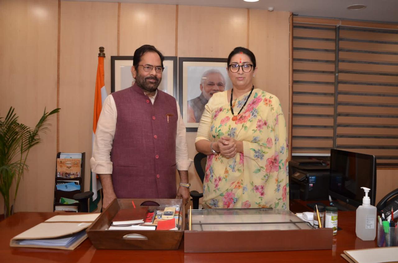 Union minister Smriti Irani takes charge of the ministry of minority affairs from Mukhtar Abbas Naqvi on Thursday. (Twitter@naqvimukhtar)