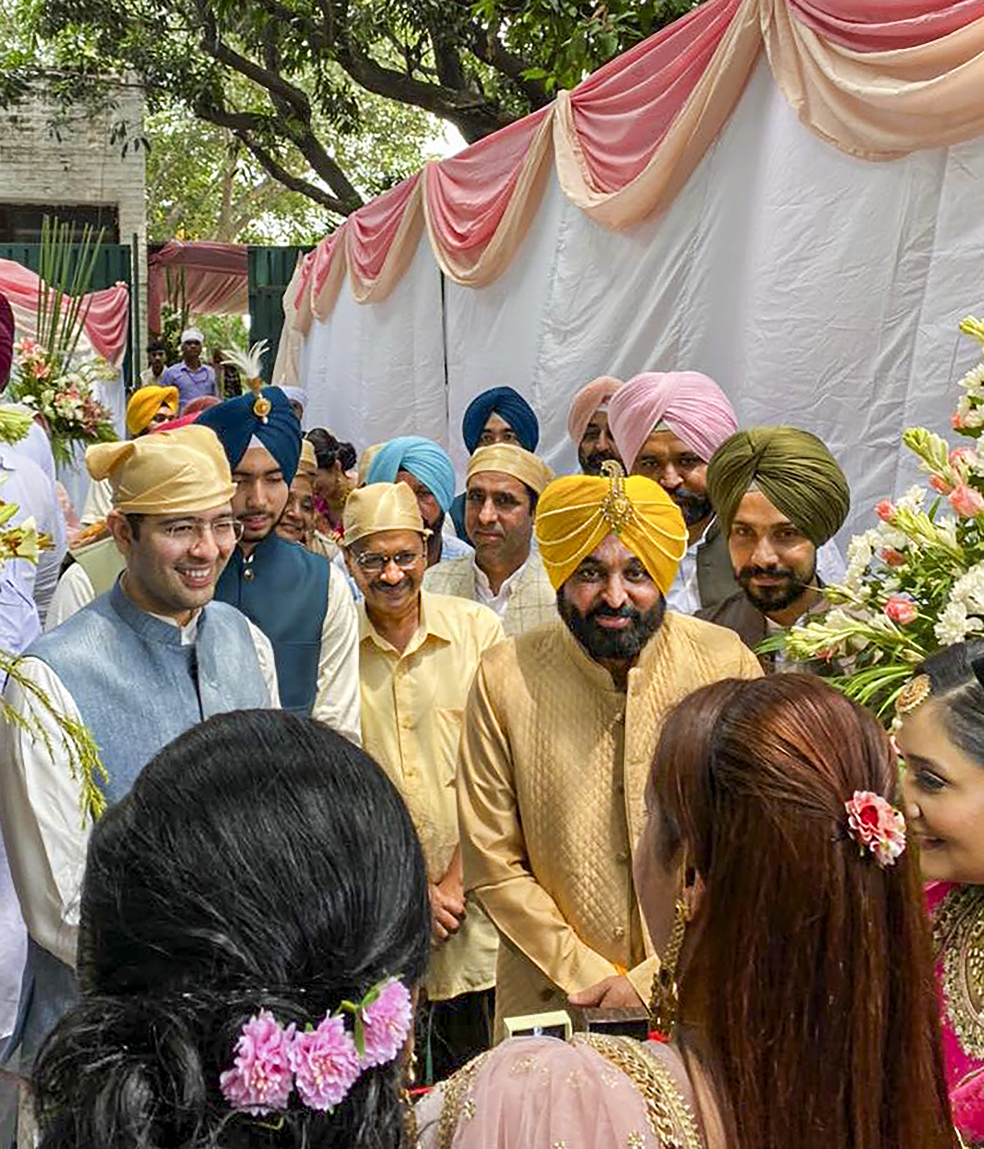 Punjab CM Bhagwant Mann during his wedding ceremony in Chandigarh. AAP leaders Arvind Kejriwal and Raghav Chadha are also seen. (PTI photo) Punjab CM Bhagwant Mann during his wedding ceremony in Chandigarh. AAP leaders Arvind Kejriwal and Raghav Chadha are also seen. (PTI photo)
