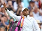 Spain's Rafael Nadal walks off the court after winning his quarter final match against Taylor Fritz of the U.S.
