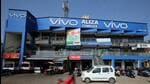 A scooterist rides past a shopping complex with the billboard of Chinese smartphone maker Vivo in Ahmedabad, India, December 14, 2018 REUTERS/Amit Dave (REUTERS) A scooterist rides past a shopping complex with the billboard of Chinese smartphone maker Vivo in Ahmedabad, India, December 14, 2018 REUTERS/Amit Dave (REUTERS)