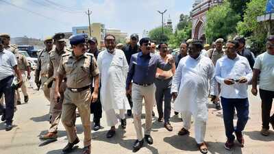 DM Aligarh Indra Vikram Singh and SSP Aligarh Kalanidhi Naithani inspecting arrangements and interacting with office bearers of Shahjamal Eidgah Management Committee in Aligarh on Friday. (HT PHOTO)