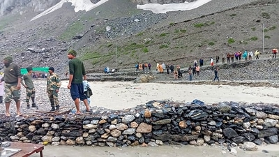 Amarnath: Rescue operation after a cloudburst that hit near the base camp of the holy cave shrine of Amarnath in south Kashmir Himalayas. (PTI) Amarnath: Rescue operation after a cloudburst that hit near the base camp of the holy cave shrine of Amarnath in south Kashmir Himalayas. (PTI)