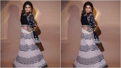 In golden earrings with embedded emerald stones from the shelves of Golecha's Jewels, Raveena further accessorised her look to perfection. (Instagram/@officialraveenatandon)