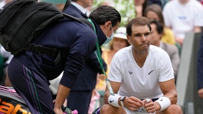 Rafael Nadal receives treatment just before a medical timeout (AP)