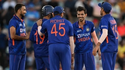 India did not let England get away in the powerplay. (AP) India did not let England get away in the powerplay. (AP)