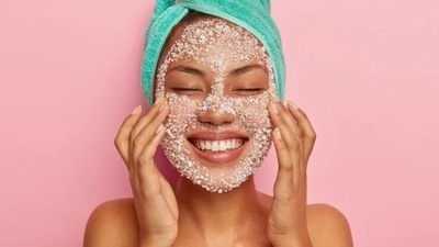4. Face scrub - While travelling, an accumulation of sweat, dirt and a change in general hygiene routine can cause clogged pores. A good face scrub can help clear the clogged pores and will keep you away from acne and wrinkles.&nbsp; (Shutterstock)