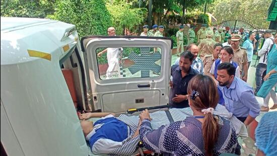 An injured student being rushed to hospital after the tree fell on the Carmel Convent School campus in Chandigarh on Friday. (Ravi Kumar/HT) An injured student being rushed to hospital after the tree fell on the Carmel Convent School campus in Chandigarh on Friday. (Ravi Kumar/HT)