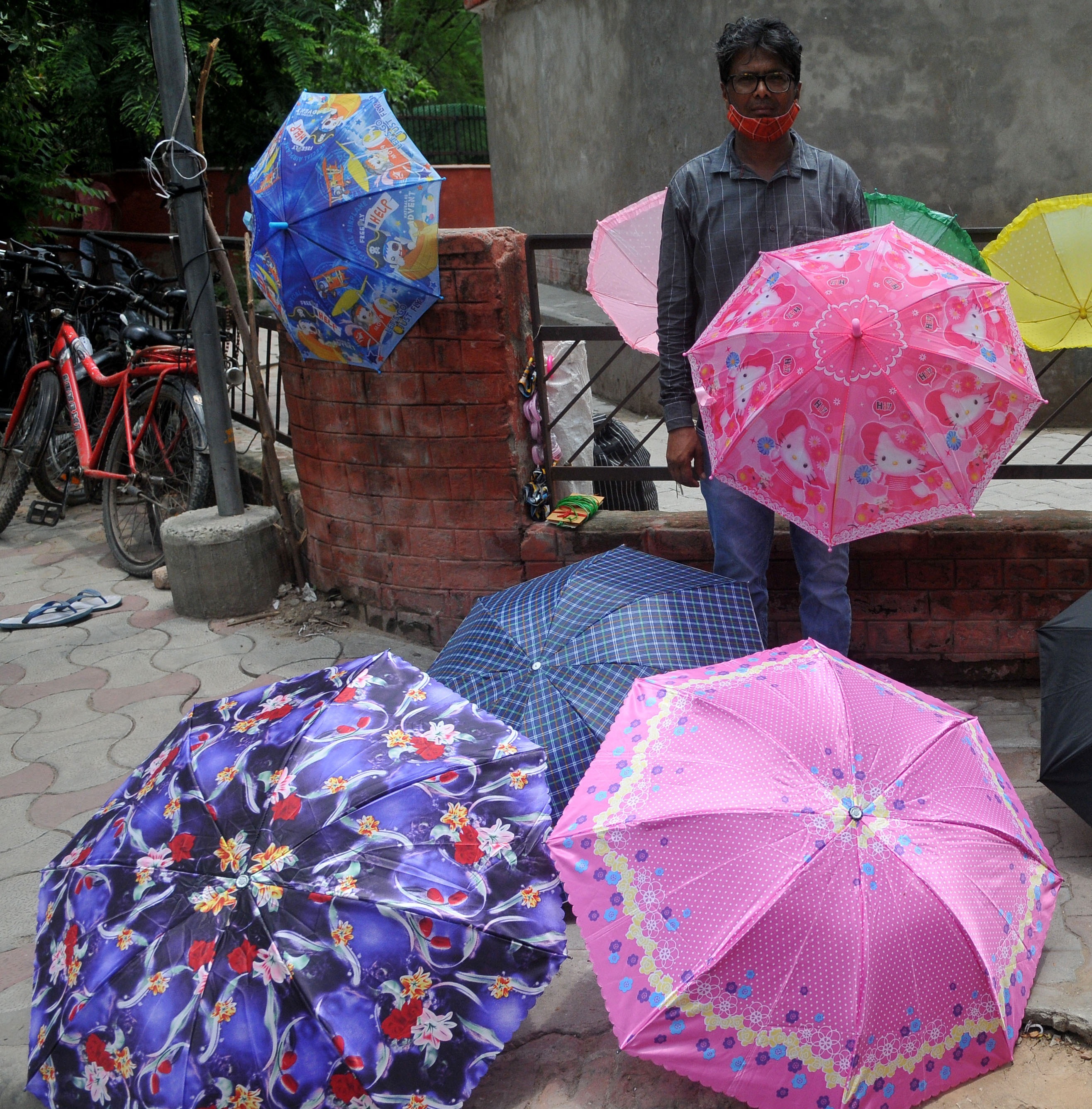 While umbrellas for kids start at  ₹250, those for adults are available from  ₹350. (Ravi Kumar/HT)