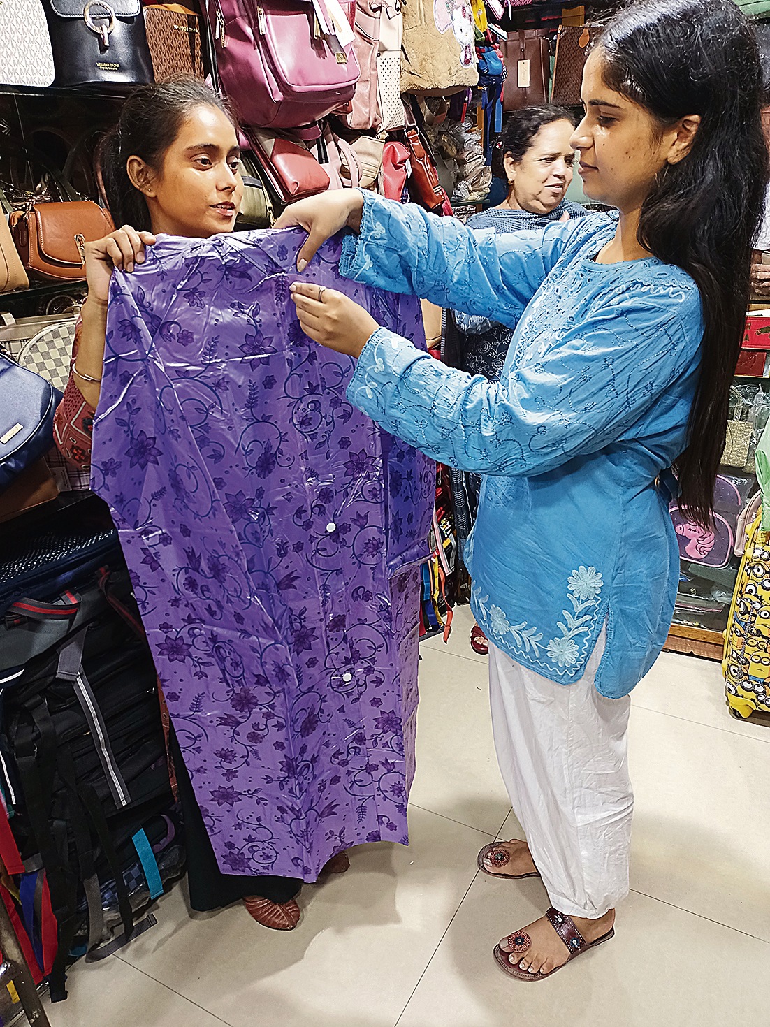 While plain raincoats will cost you around  ₹250; printed and designed ones are available at  ₹580 at tricity markets. (HT Photo)
