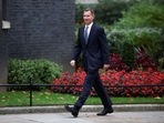 MP Jeremy Hunt walks outside Downing Street in London, Britain.