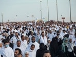Thousands of Muslim pilgrims make their way across the valley of Mina, near Mecca in western Saudi Arabia, to perform the 