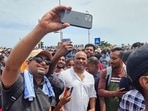 Former Sri Lanka cricket captain Sanath Jayasuriya with protesters in Colombo.