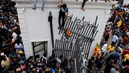 Demonstrators protest inside the President's House premises.