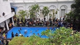 Protesters took the opportunity to cool off in the swimming pool in President Gotabaya Rajapaksa’s official residence after storming the compound.