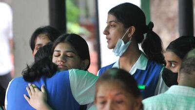 Heerakshi’s classmates consoling each other during her cremation at Sector 25 in Chandigarh on Saturday. (Ravi Kumar/HT) Heerakshi’s classmates consoling each other during her cremation at Sector 25 in Chandigarh on Saturday. (Ravi Kumar/HT)