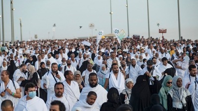 Thousands of Muslim pilgrims make their way across the valley of Mina, near Mecca in western Saudi Arabia, to perform the "stoning of the devil" ritual which marks the start of the Eid al-Adha holiday on July 9, 2022. (AFP) Thousands of Muslim pilgrims make their way across the valley of Mina, near Mecca in western Saudi Arabia, to perform the "stoning of the devil" ritual which marks the start of the Eid al-Adha holiday on July 9, 2022. (AFP)