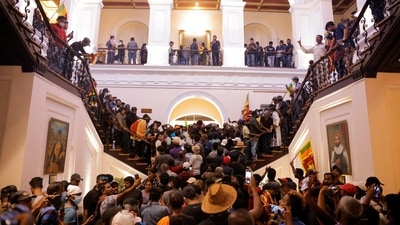 Demonstrators protest inside the President's House, after President Gotabaya Rajapaksa fled, amid the country's economic crisis, in Colombo, (Reuters)