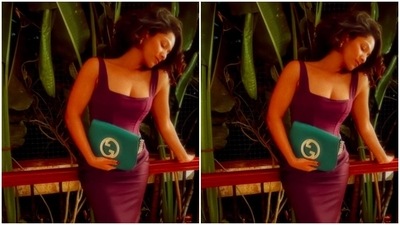 While the corset top features a wide neckline, structured boning on the front and asymmetric cropped hemline, the skirt comes with a high-rise waist. The bodycon silhouette of the ensemble perfectly accentuated the designer's enviable curves. (Instagram) While the corset top features a wide neckline, structured boning on the front and asymmetric cropped hemline, the skirt comes with a high-rise waist. The bodycon silhouette of the ensemble perfectly accentuated the designer's enviable curves. (Instagram)