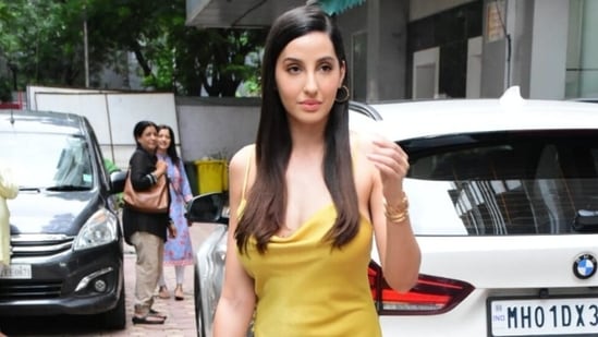 Nora Fatehi in yellow thigh-slit slip dress will steal away all your monsoon fashion blues, we love it