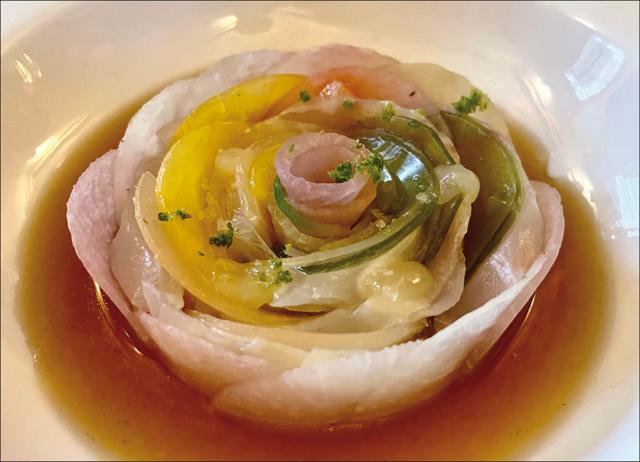 Salmon by chef Mauro Colagreco, whose three Michelin-star restaurant Mirazur has topped the World’s 50 Best Restaurants list Salmon by chef Mauro Colagreco, whose three Michelin-star restaurant Mirazur has topped the World’s 50 Best Restaurants list