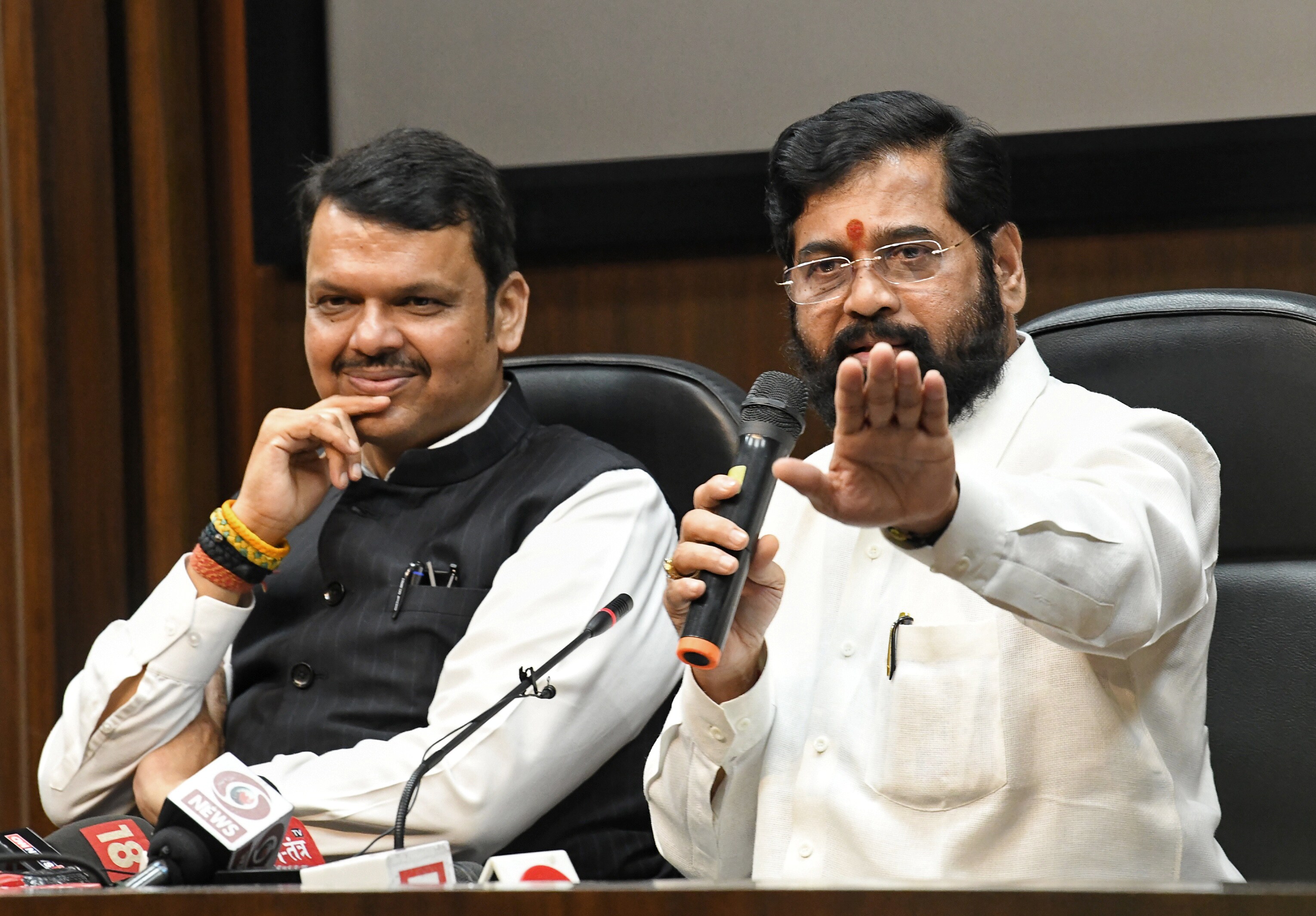 Maharashtra CM Eknath Shinde (right) and deputy CM Devendra Fadnavis (left) address a press conference, at Maharashtra Sadan in New Delhi on Saturday. (ANI Photo) (Shrikant Singh)